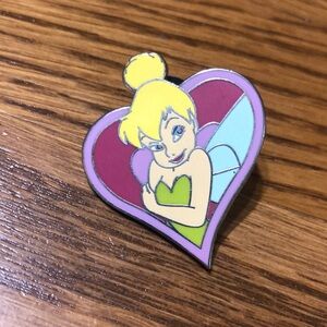 Tinkerbell crossing arms inside pink heart with accents Disney Pin Trading 2010